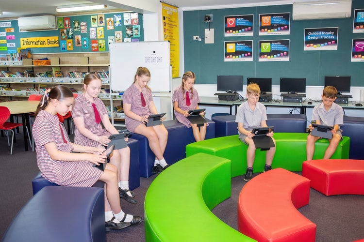 Students working with iPads as part of their learning