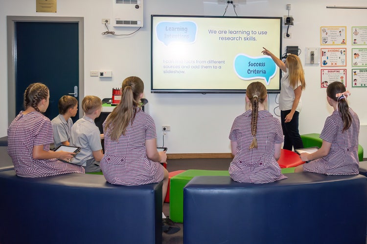 Students learning in our well resourced library.