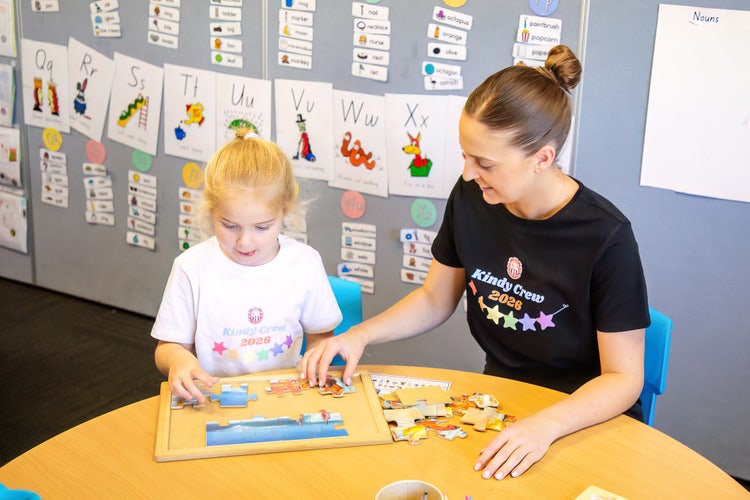 A teacher and student working together during our Transition to School program